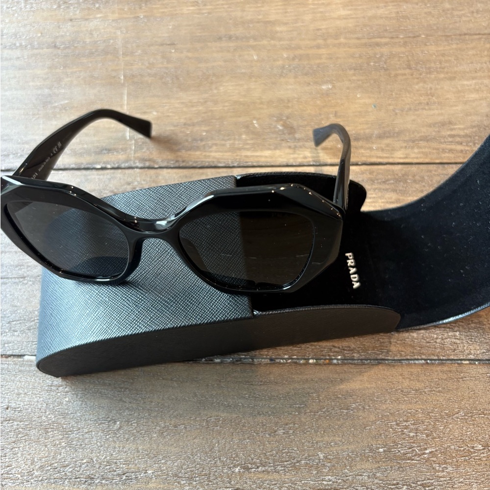 Prada Black Cat-Eye Glasses with Sleek Design